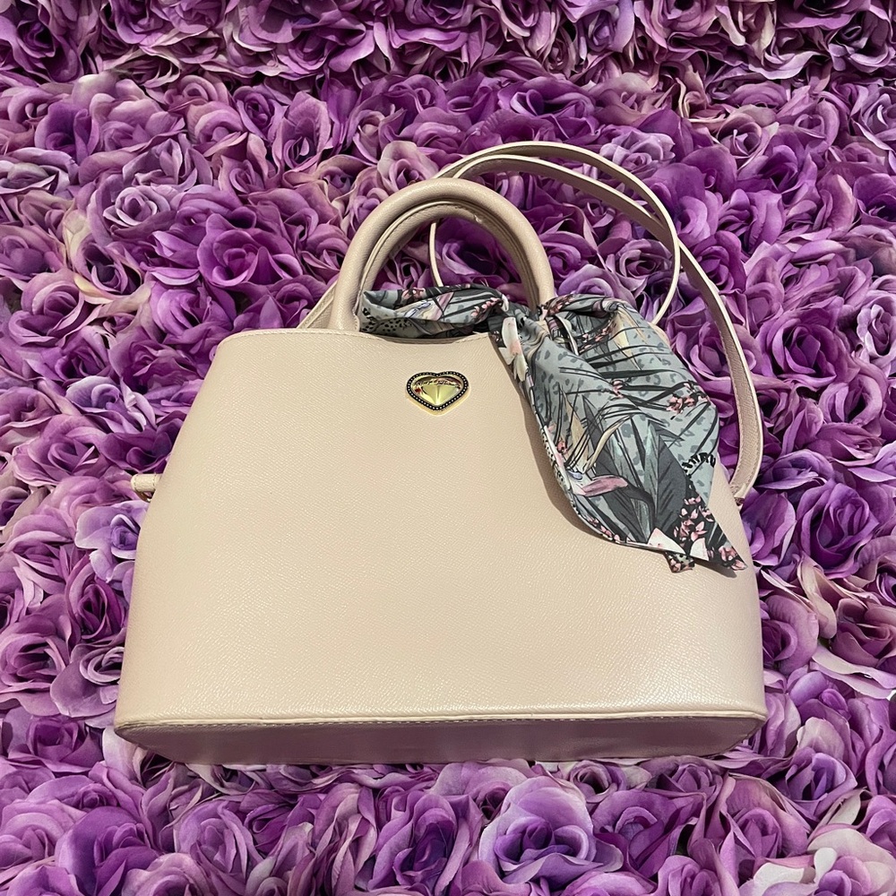 Betsey Johnson blush pink purse.